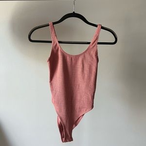 Pink ribbed body suit